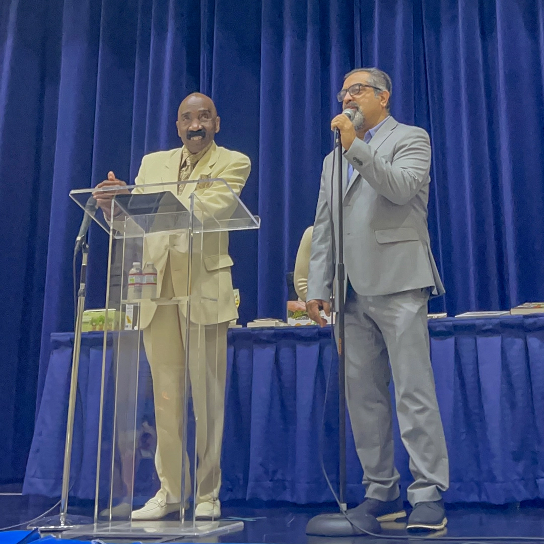 Community leaders speaking at INSPIRE program gathering