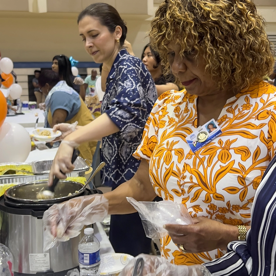 Volunteers preparing nutritious meals at community event